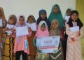 Laznas BMH Berbagi Jilbab dan Pakaian Muslim untuk Anak-Anak Pedalaman Teluk Bintuni Papua Barat