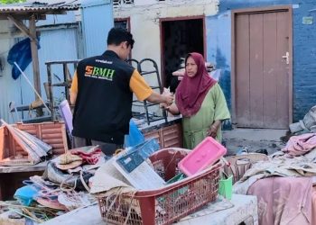 BMH Salurkan Nasi Bungkus untuk Warga Terdampak Banjir di Kampung Baru Sumatera Utara